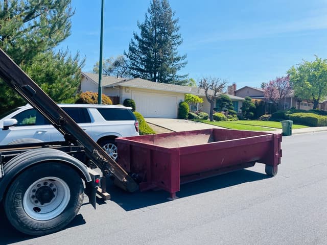 Soil dumpster delivery
